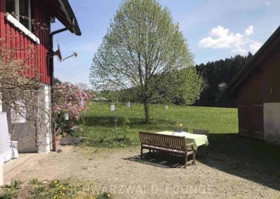 Ferienhaus Brestenberg: Garten und Hof mit Sitzgelegenheiten